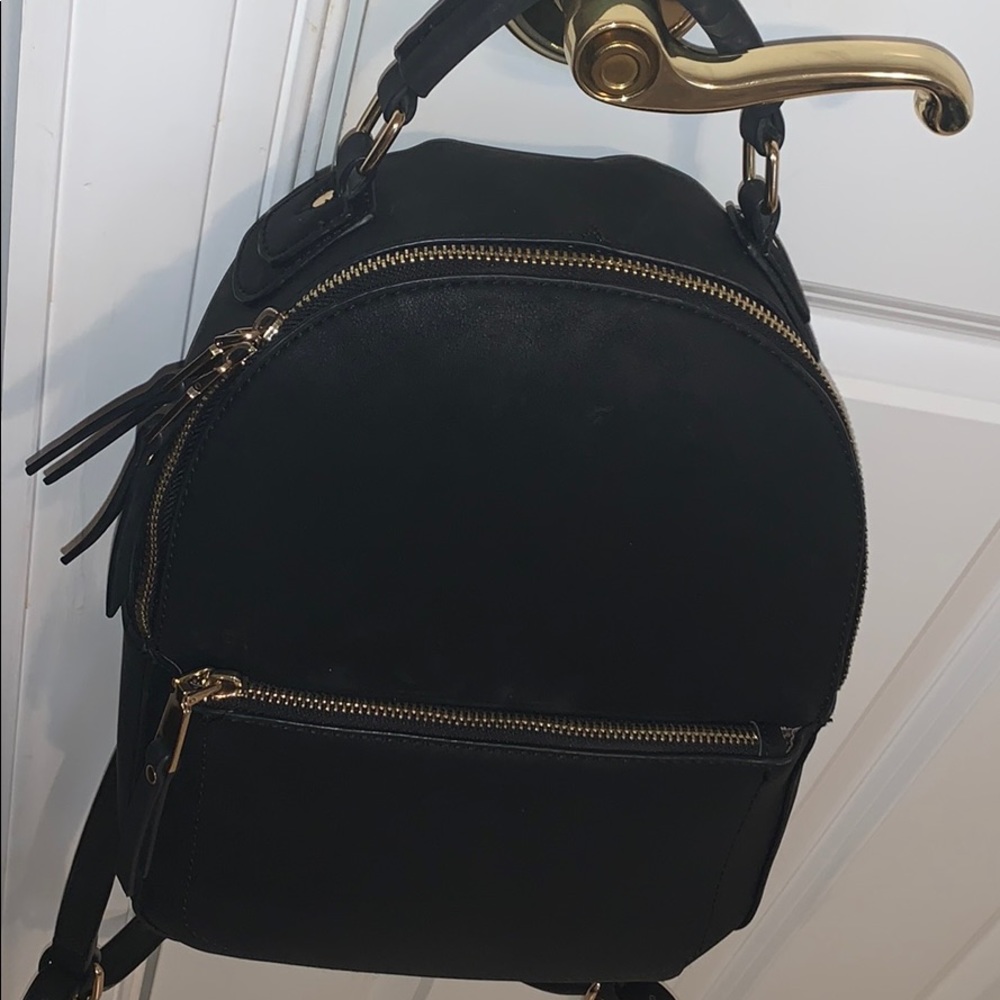 Black backpack purse